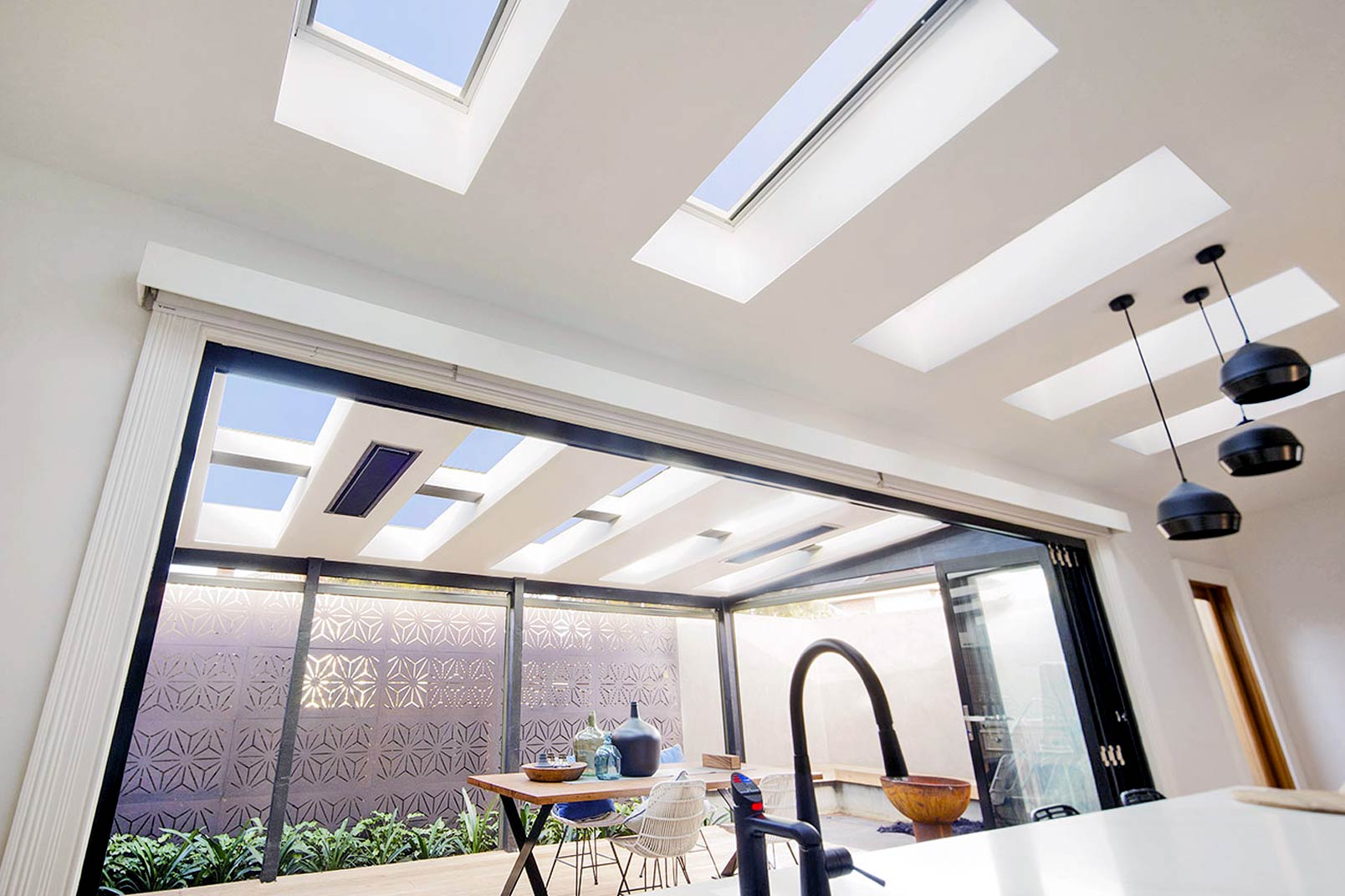 skylights in patio area and kitchen with white interior in christchurch